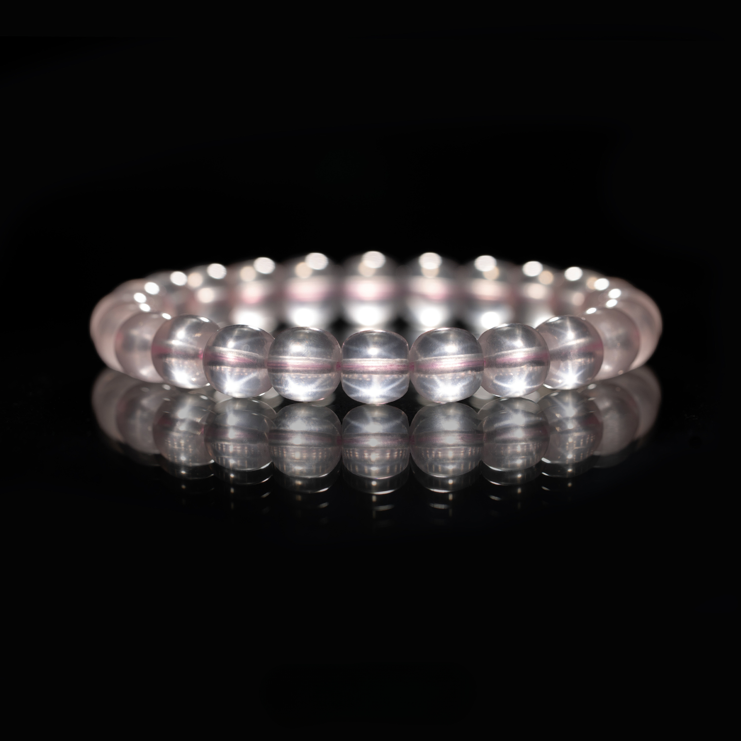 Starry-Rose-Quartz-Bracelet-9mm-1.webp Starry Rose Quartz Bracelet (9mm) - Image 1